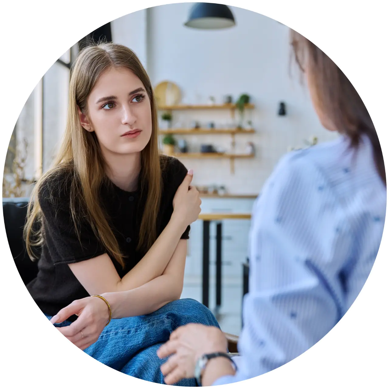Young woman attentively listening during conversation